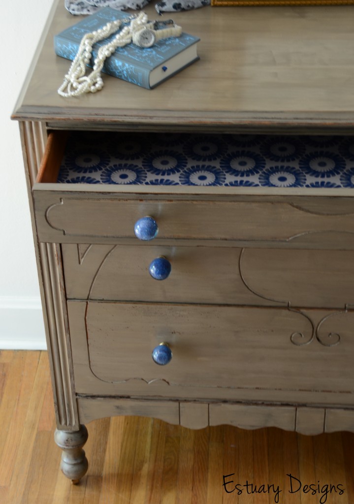 Nerissa a driftwood-esque three drawer dresser with blue glass knobs